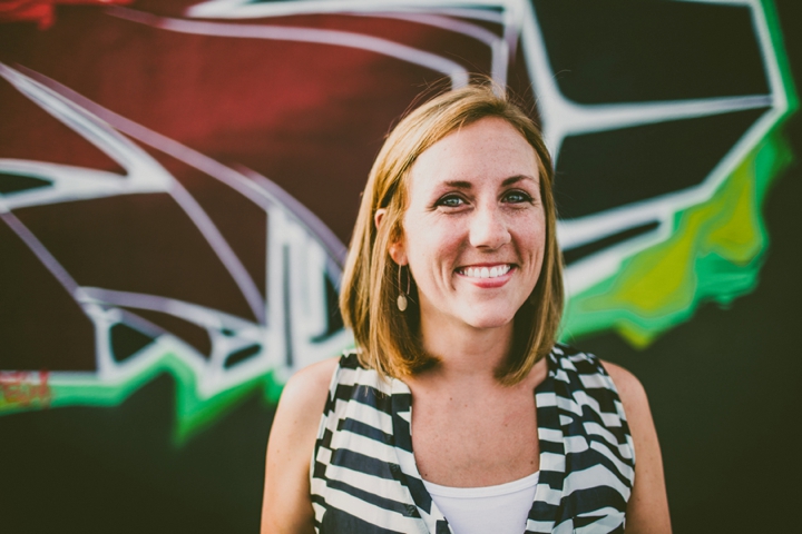 Headshot in front of graffiti wall