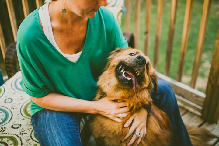 Girl holding dog