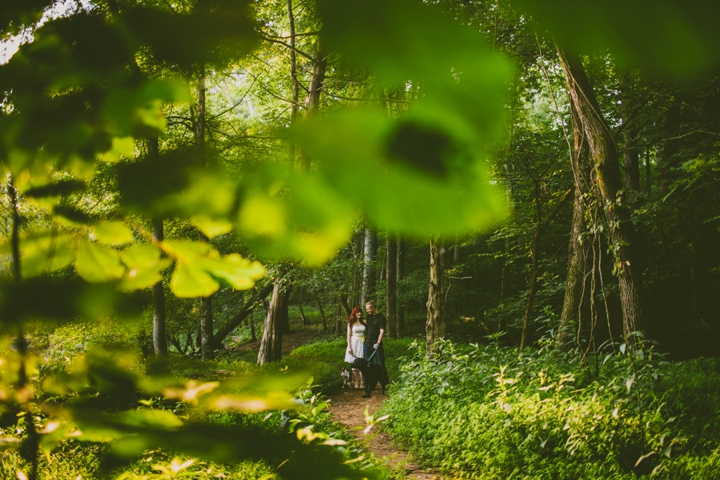 Couple standing in forest