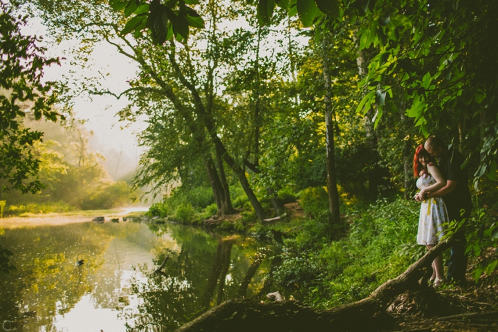 Couple standing by banks of the Eno