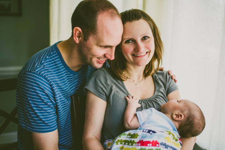 Family smiling with baby