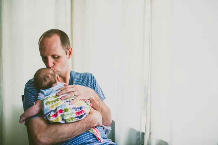 Father holding baby