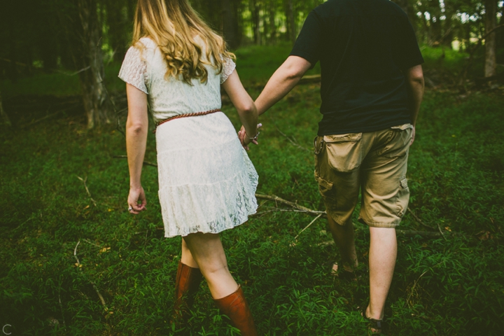 Couple holding hands and walking