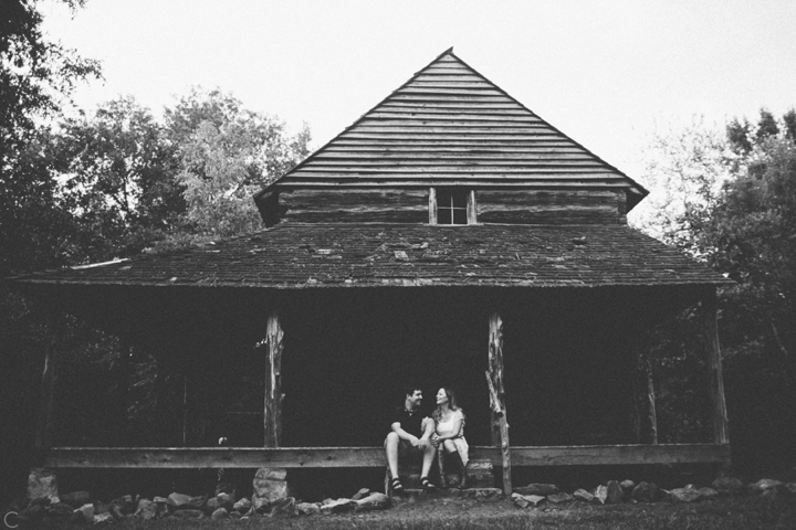 Couple sitting on cottage stairs