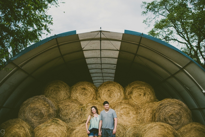 Couple with hay bales