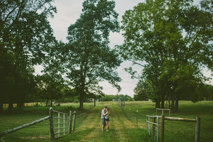 Couple standing on farm