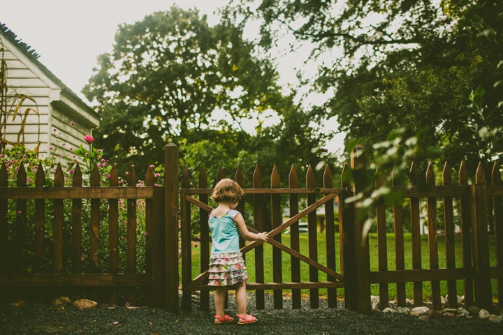 Kid opening fence