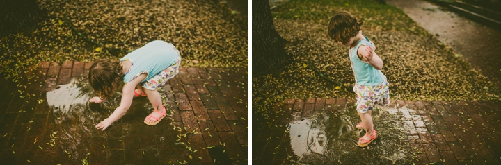 Kid playing in puddle