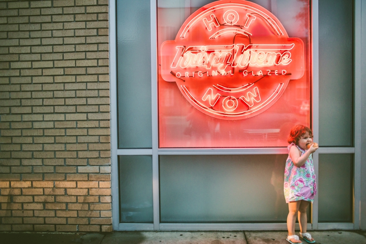 Kid eating donuts