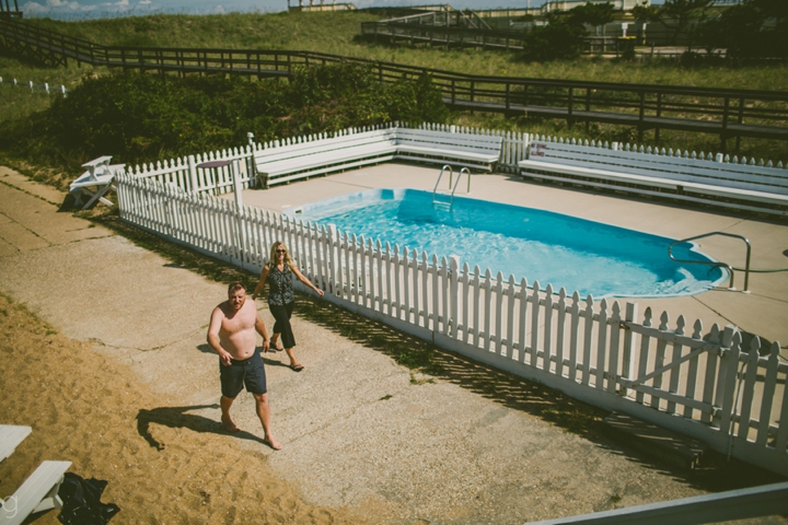 Man walking to house after swim