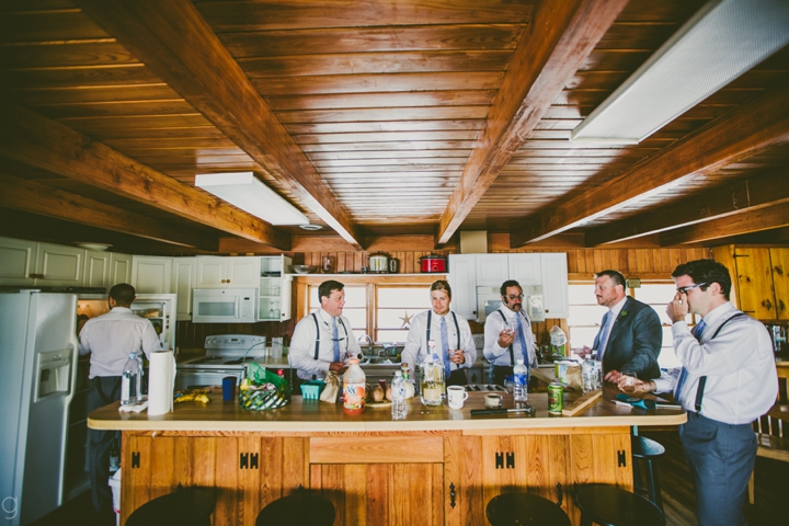Groomsmen hanging out in kitchen