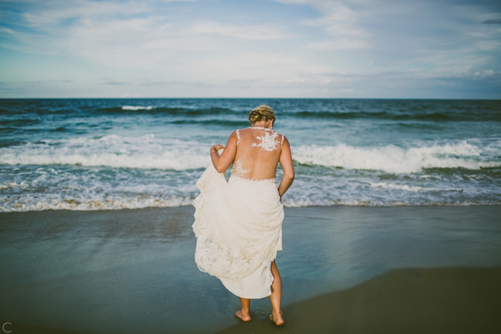 Bride walking on beach