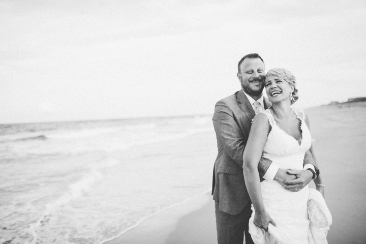 Black and white portrait couple on beach