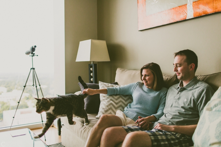 Couple sitting with cat