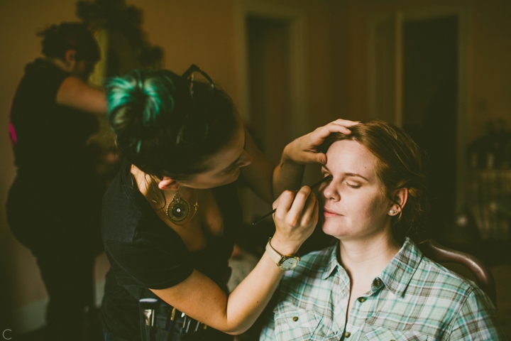 Bride getting makeup done