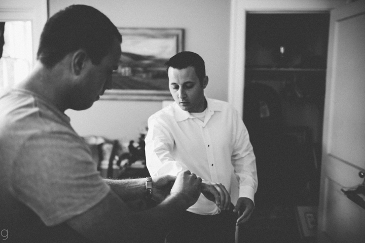 Groom getting dressed