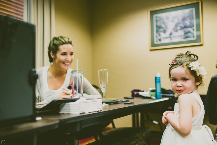 Bride talking to flower girl