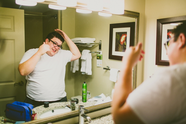 Groom combing his hair