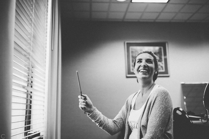 Bride putting on makeup