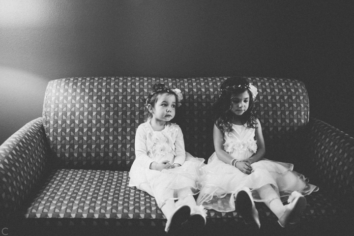 Flower girls sitting on couch