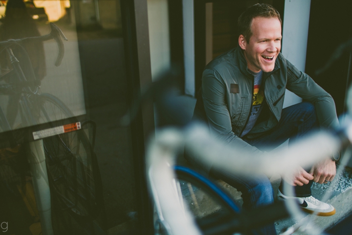 Man laughing in doorway