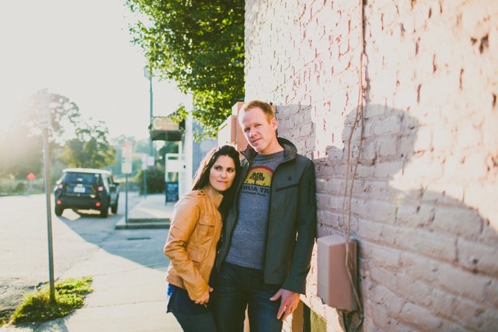 Husband and wife standing on street