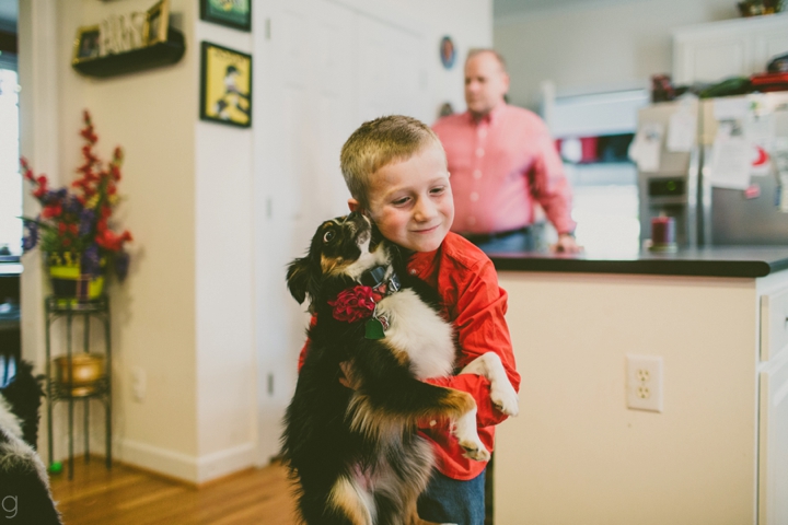 Kid holding a dog
