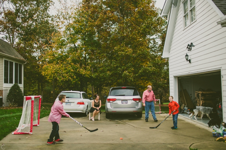 Family playing hockey