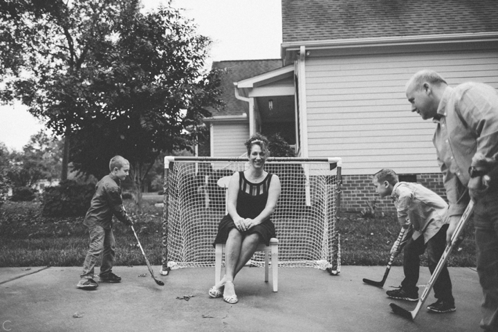 Family playing hockey