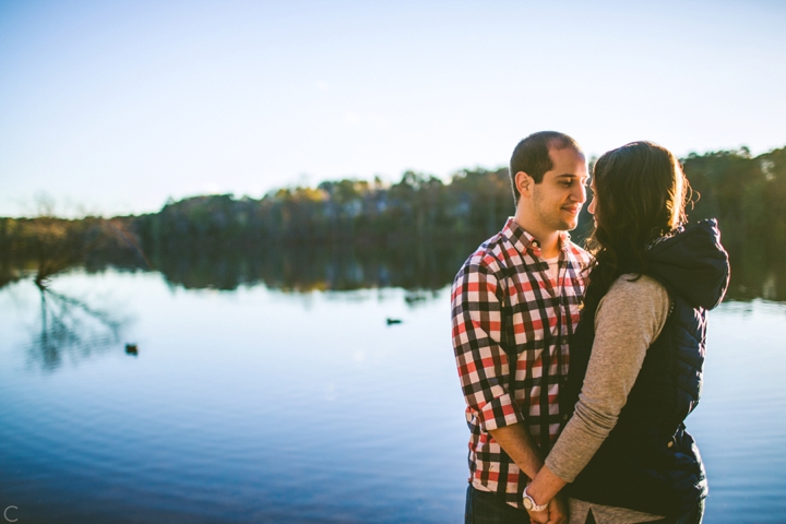 Couple standing by lake