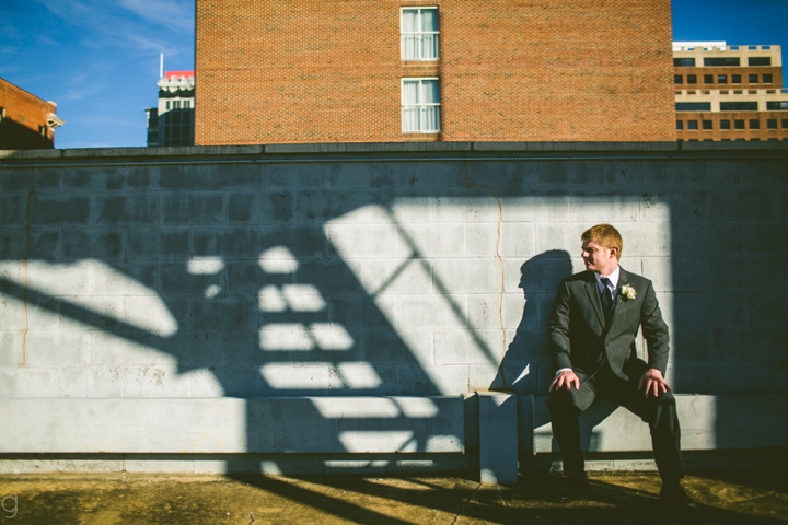 Groom portrait near stairs