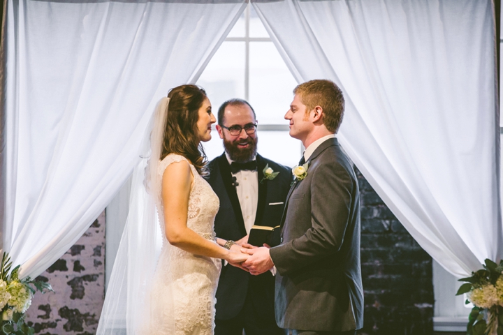 Bride and groom at homemade alter