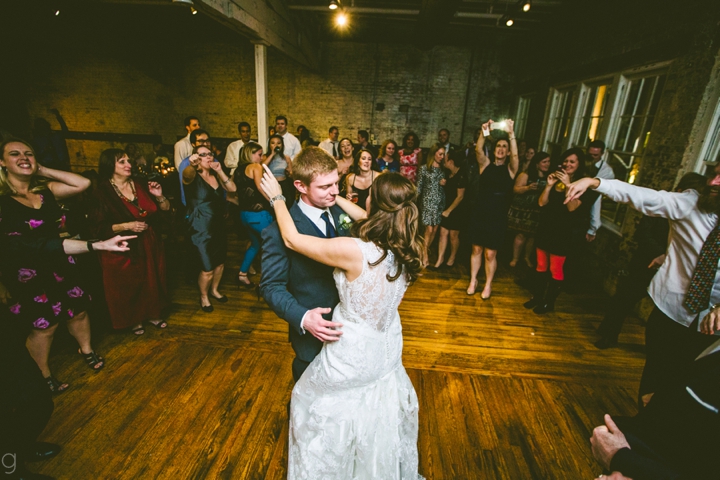 Husband and wife dancing at wedding reception