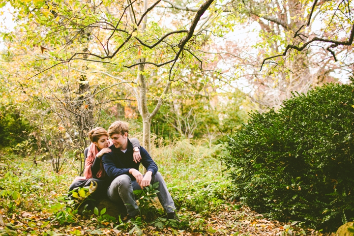 Couple cuddling at UNC arboretum