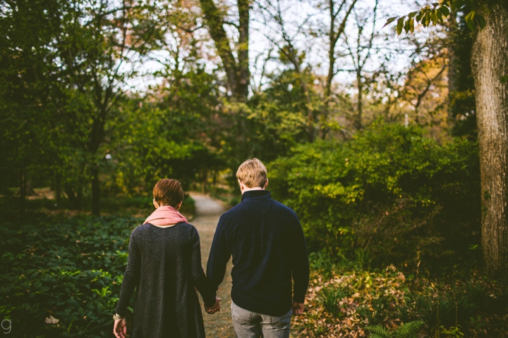 Couple walking through park