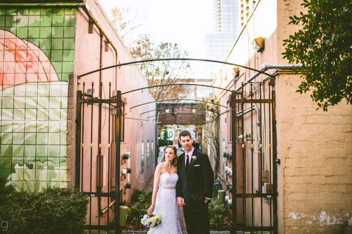 Husband and wife pose for wedding portraits