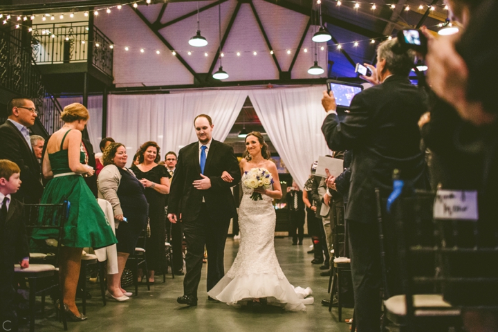 Bride walking down the aisle at 214 Martin St wedding