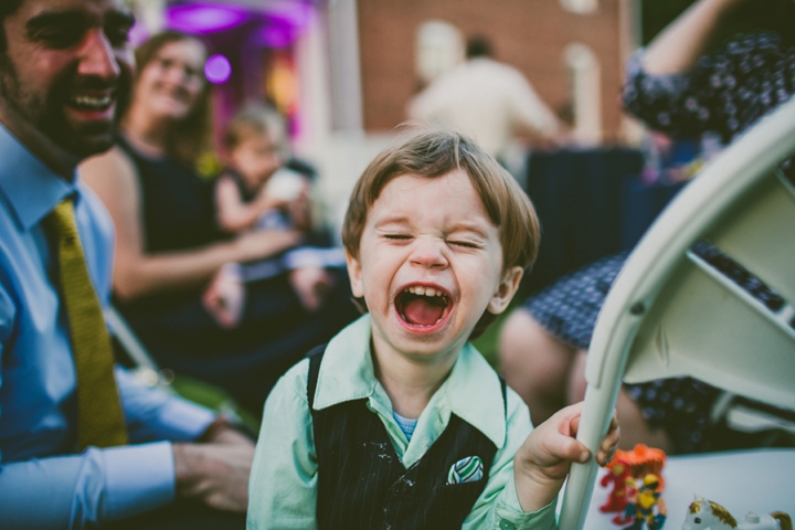 Kid laughing at reception