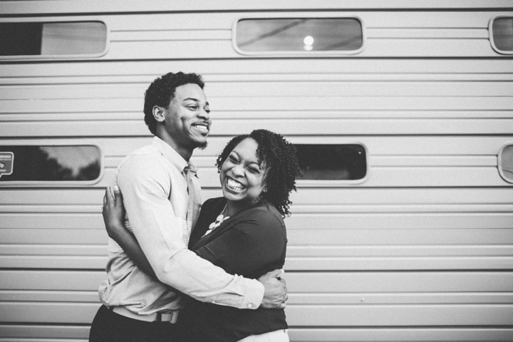 Couple smiling during engagement photos