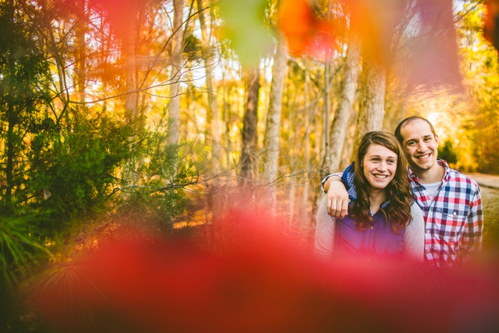 Couple laughing in the woods