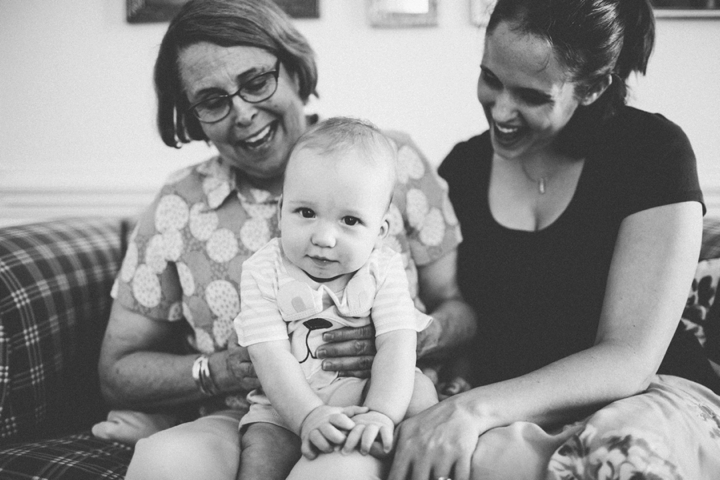 Black and white smiling baby photograph