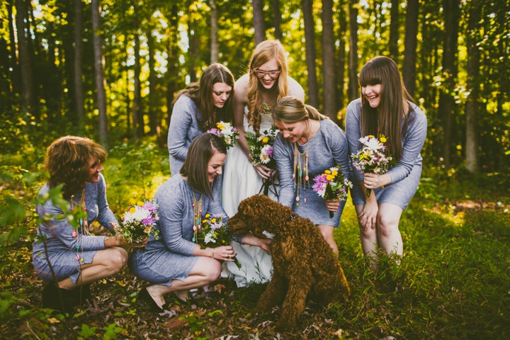 Bridesmaids talking to dog