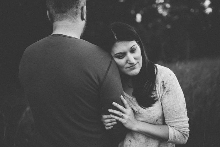 Woman resting her head on husband's shoulder