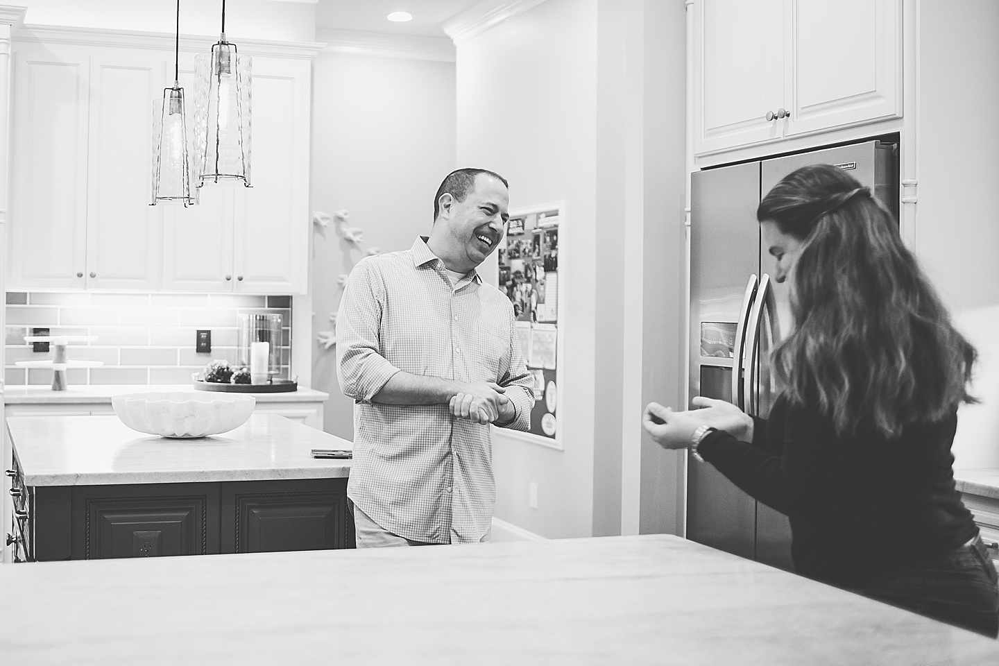 Dad laughing in the kitchen