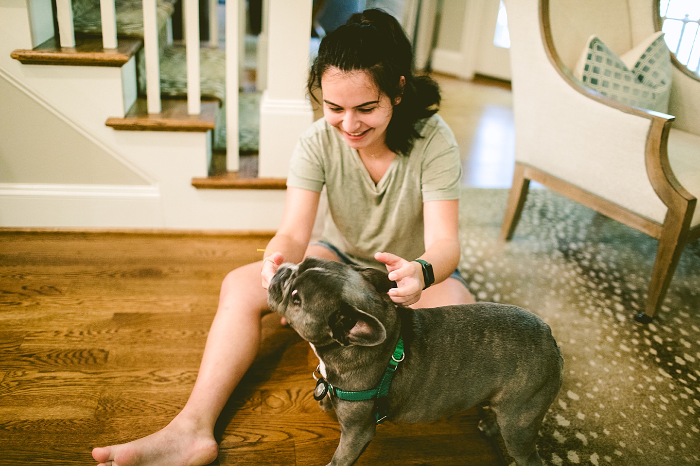 Girl petting her dog