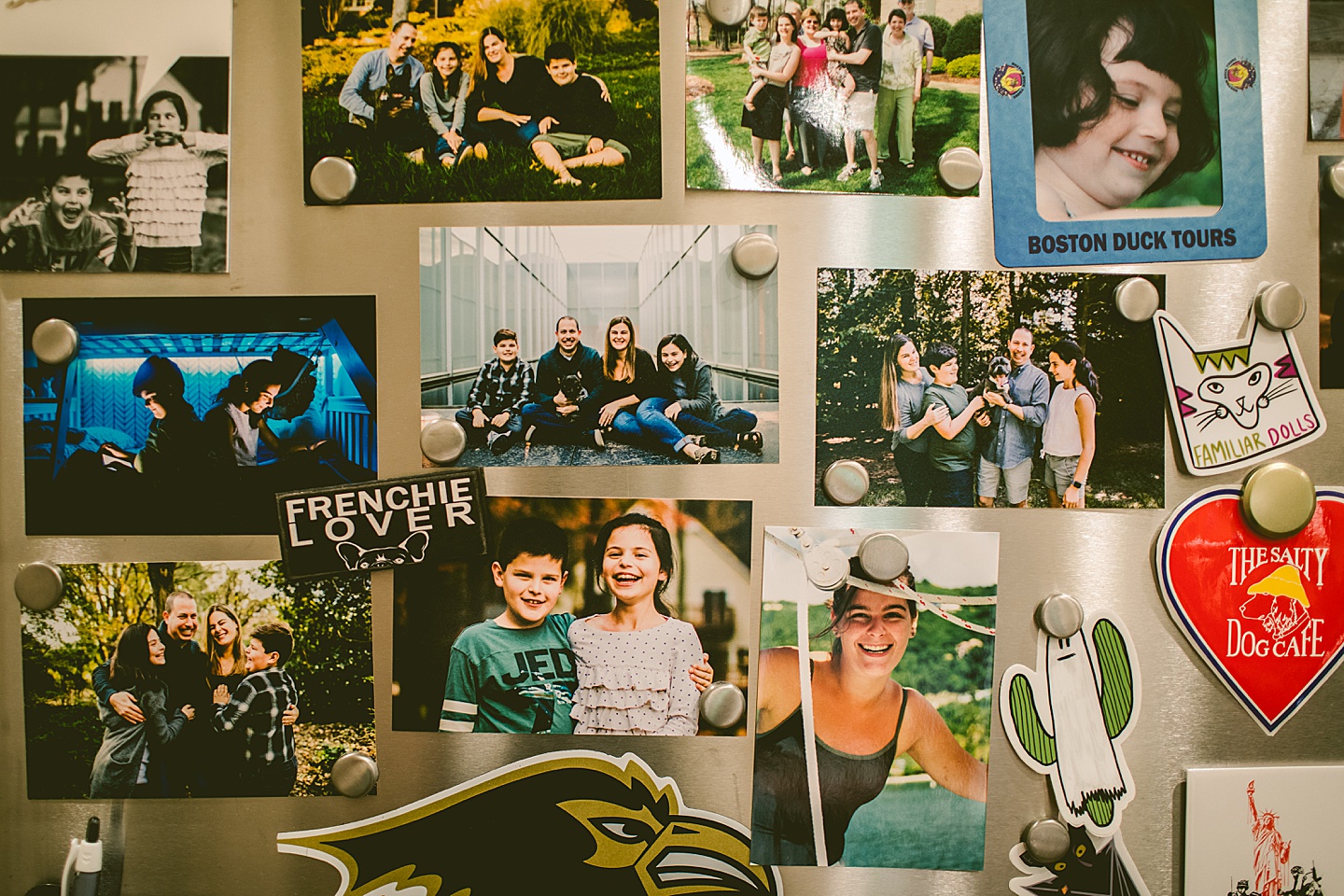 Family photos displayed on magnet board