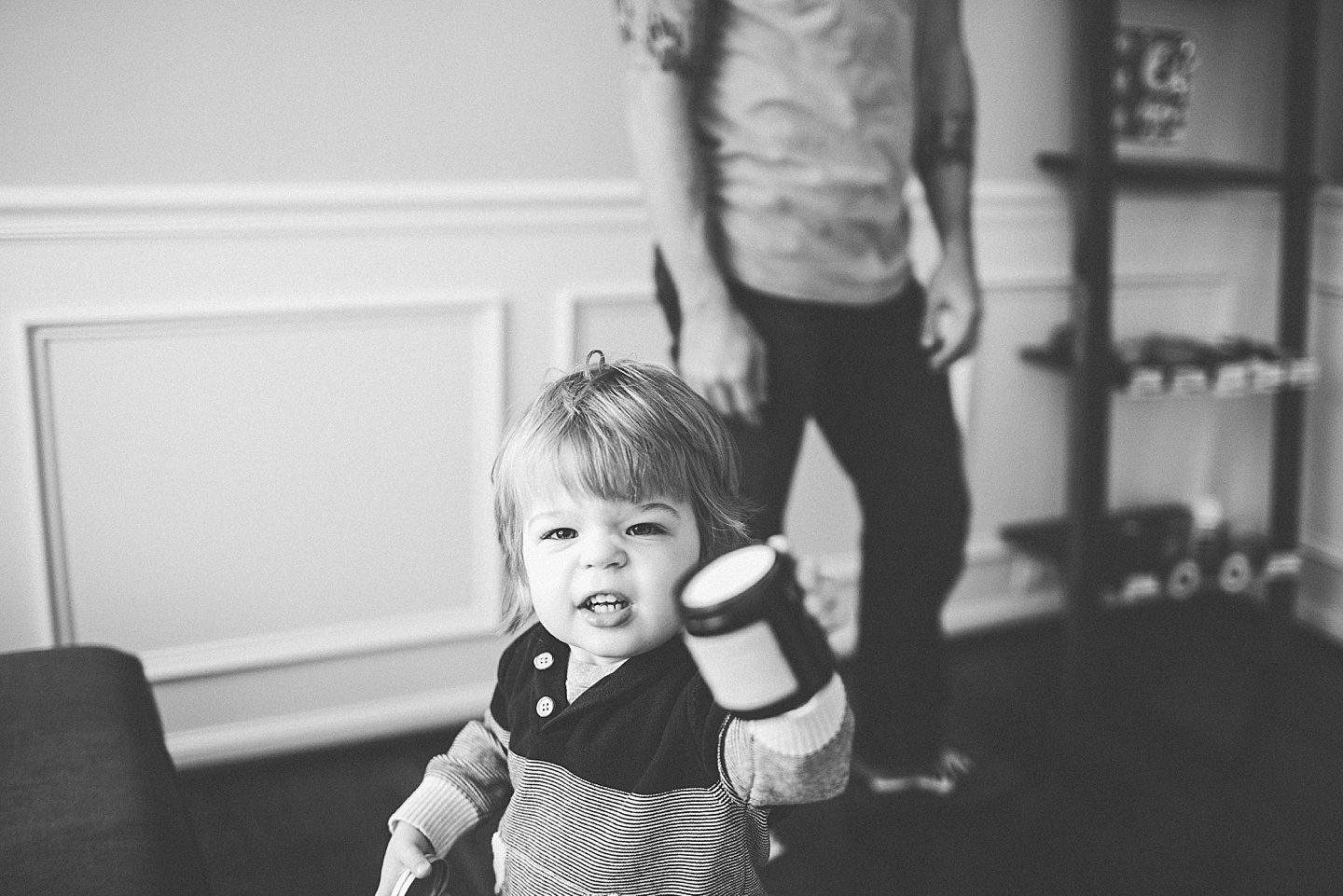 Kid holding a candle out for you to smell