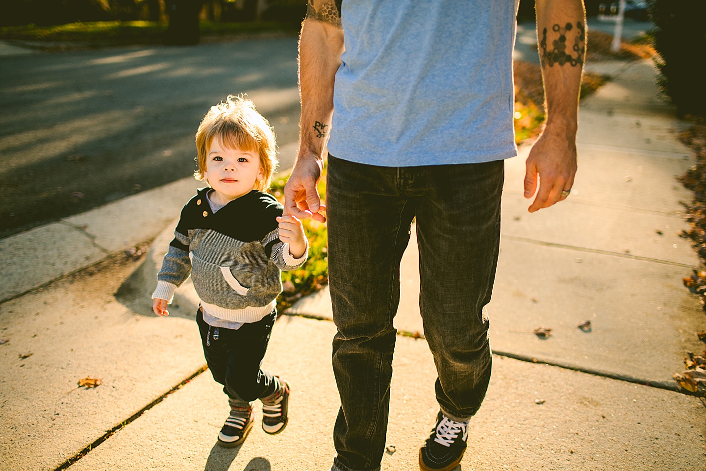 Toddler going on walk with parents