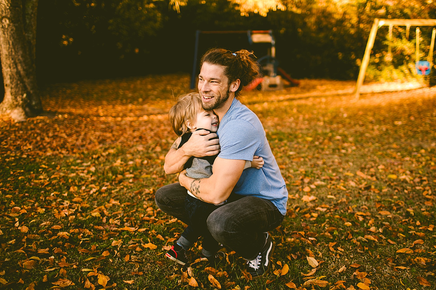 Toddler hugging his dad