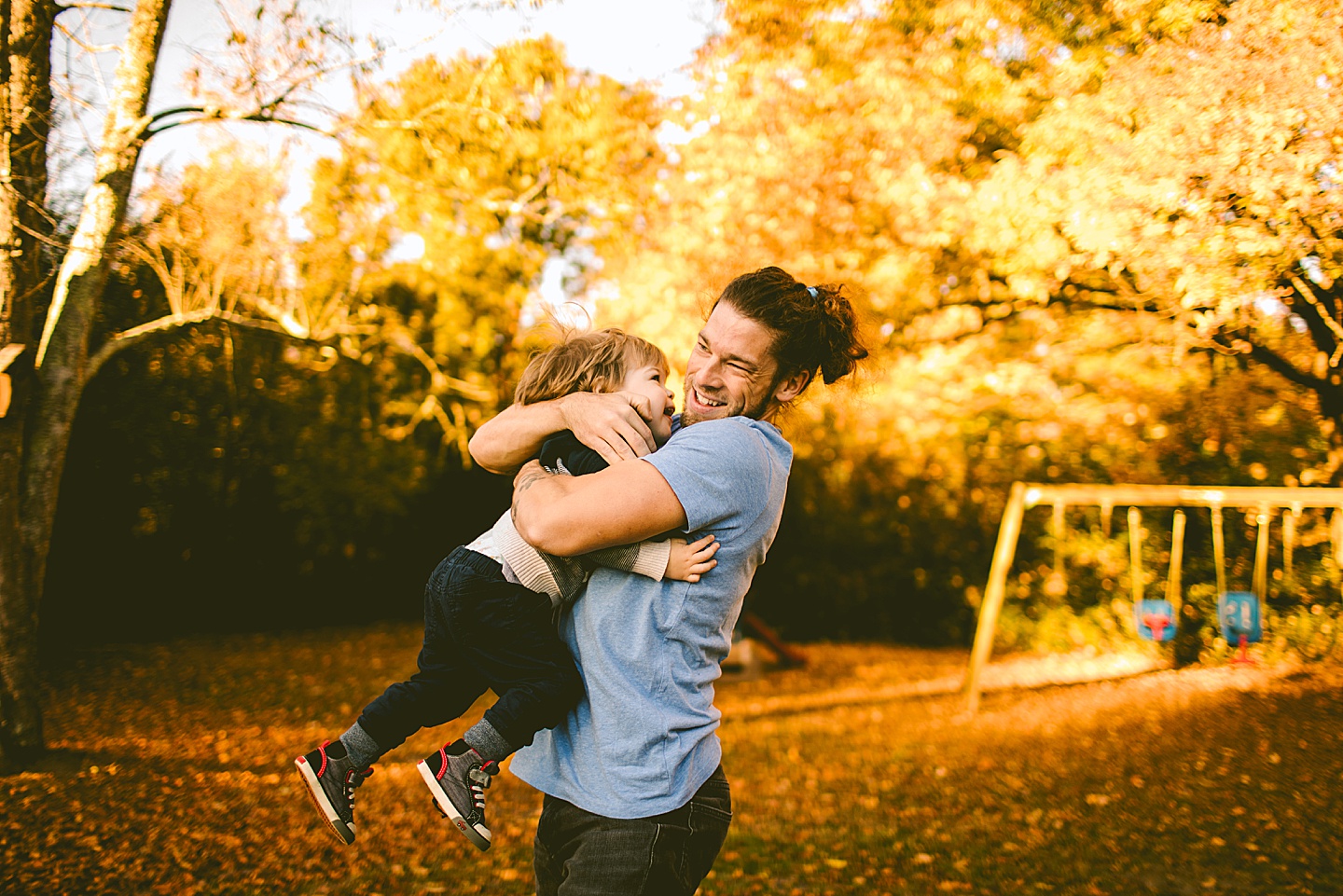 Toddler hugging his dad